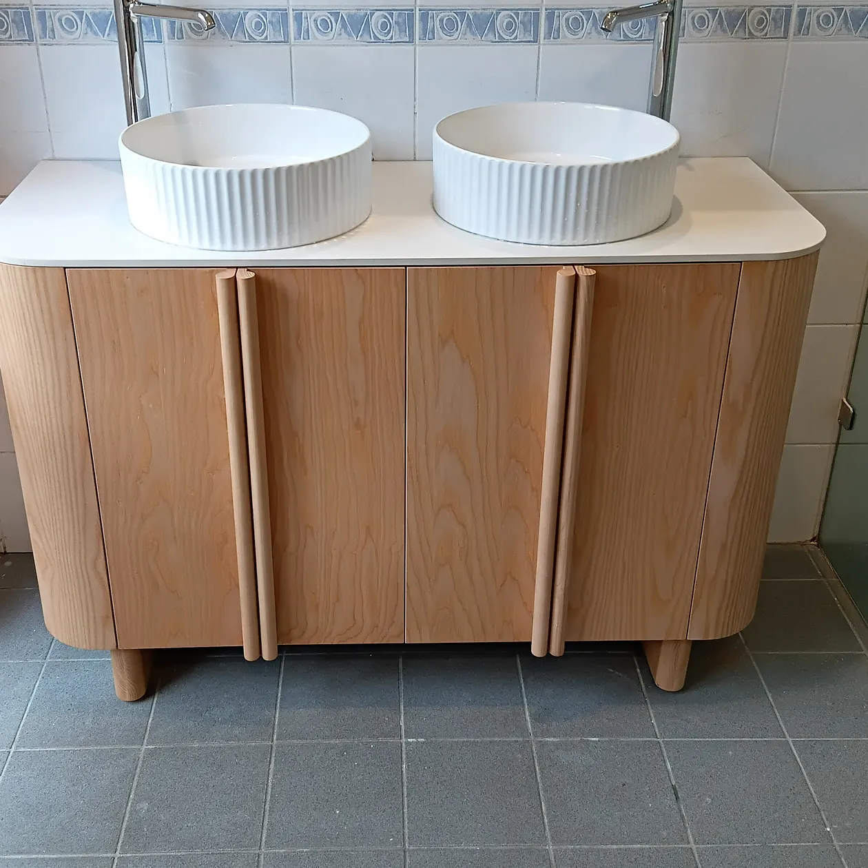 New double vanity with twin basins and mixer taps installed in a bathroom